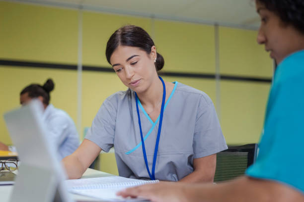 Nursing candidate answering an adaptive NCLEX question on a testing center computer Suggested
